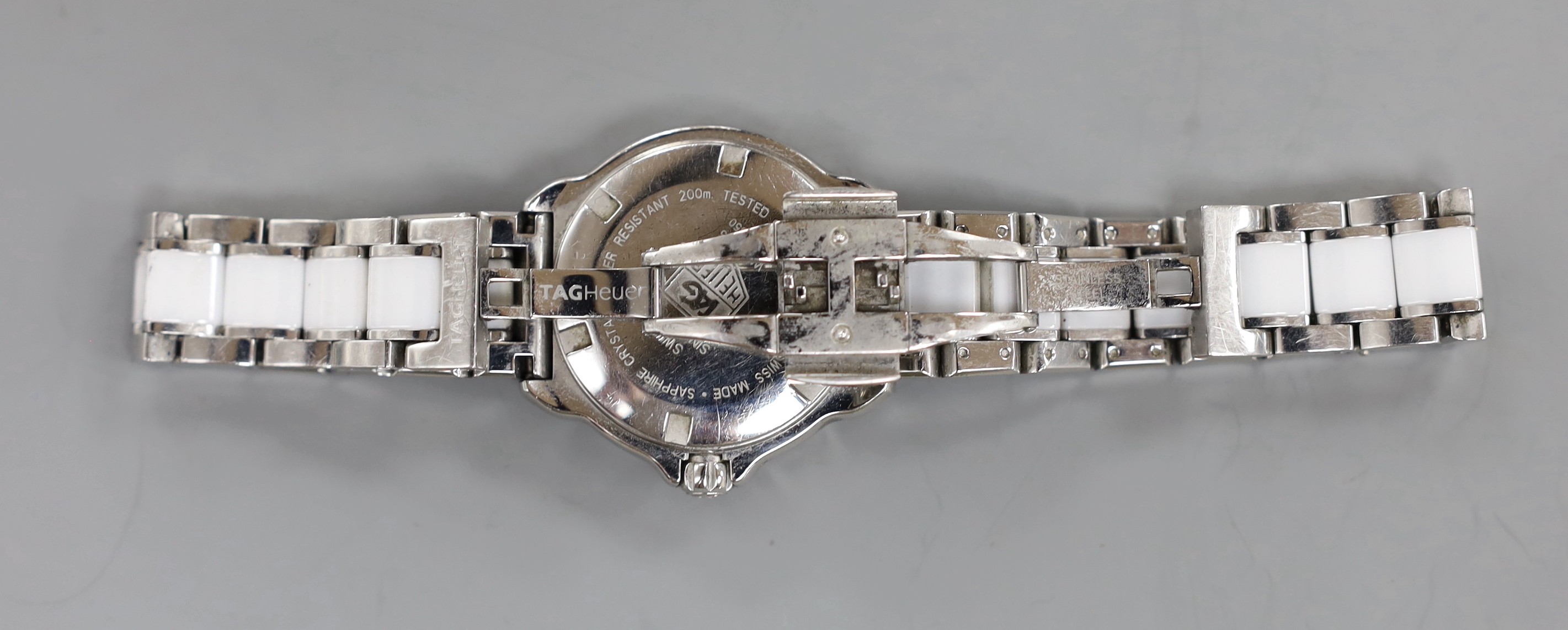 A lady's Tag Heuer Formula One quartz wristwatch (with box and receipt).